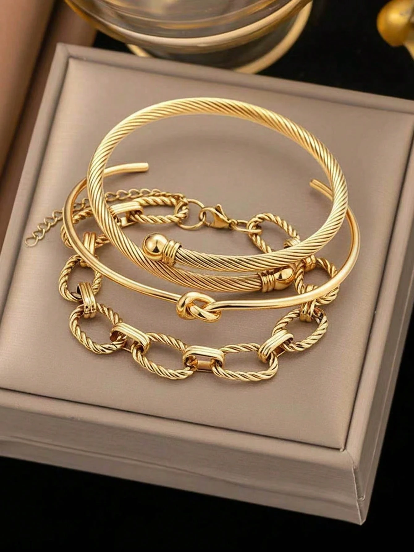 Set de 3 Pulseras Doradas de Acero